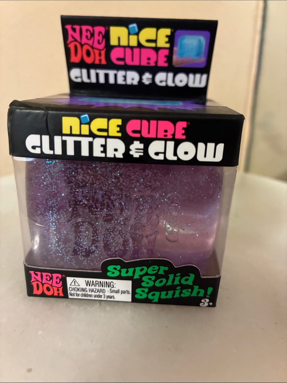 NeeDoh Nice Cube Glitter & Glow Super Solid Squish - Purple Glitter